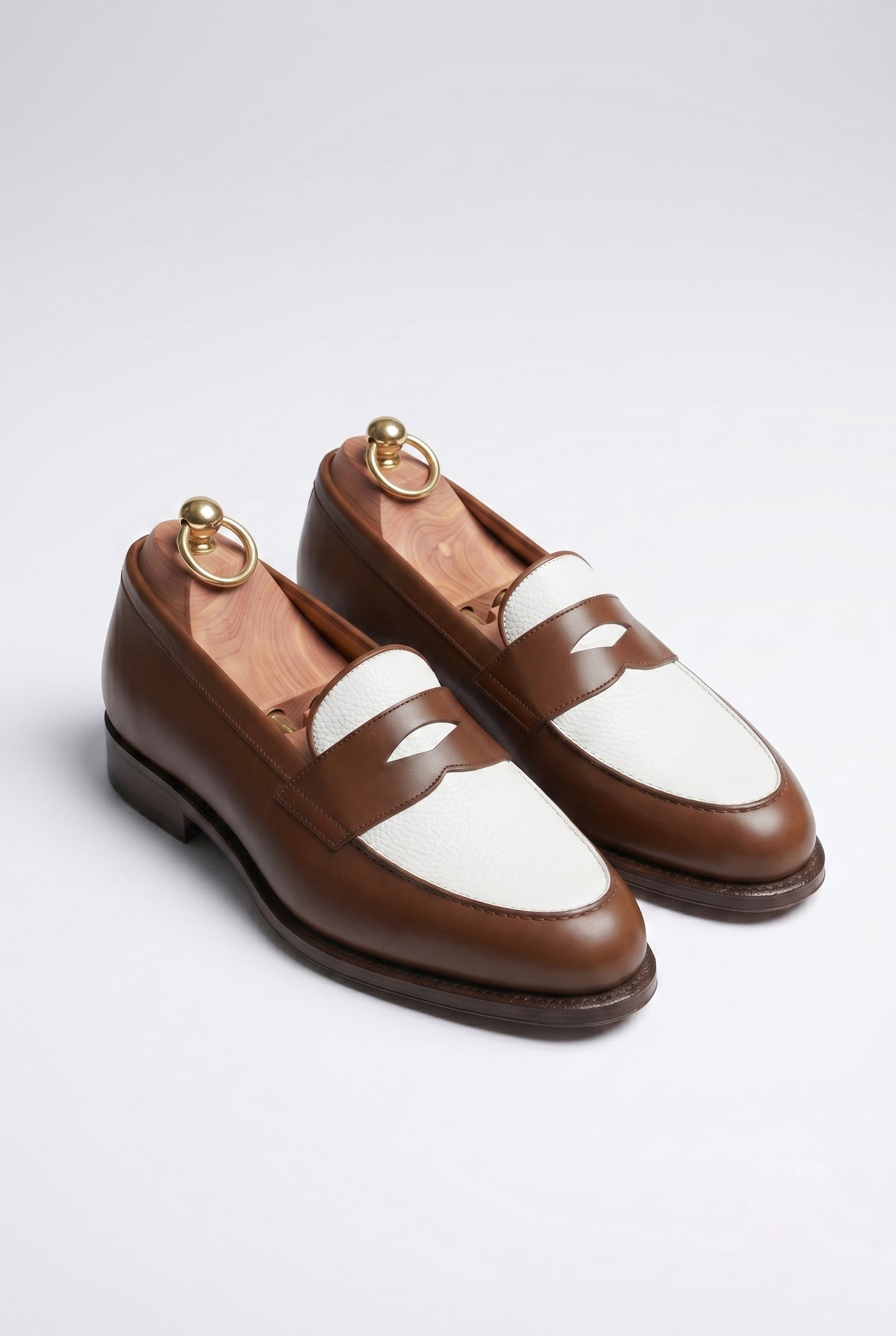 The Venice Two-Tone Penny Loafers in Chestnut Brown & Cream