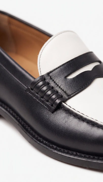 The Venice Two-Tone Penny Loafers in Noir Black & Ivory
