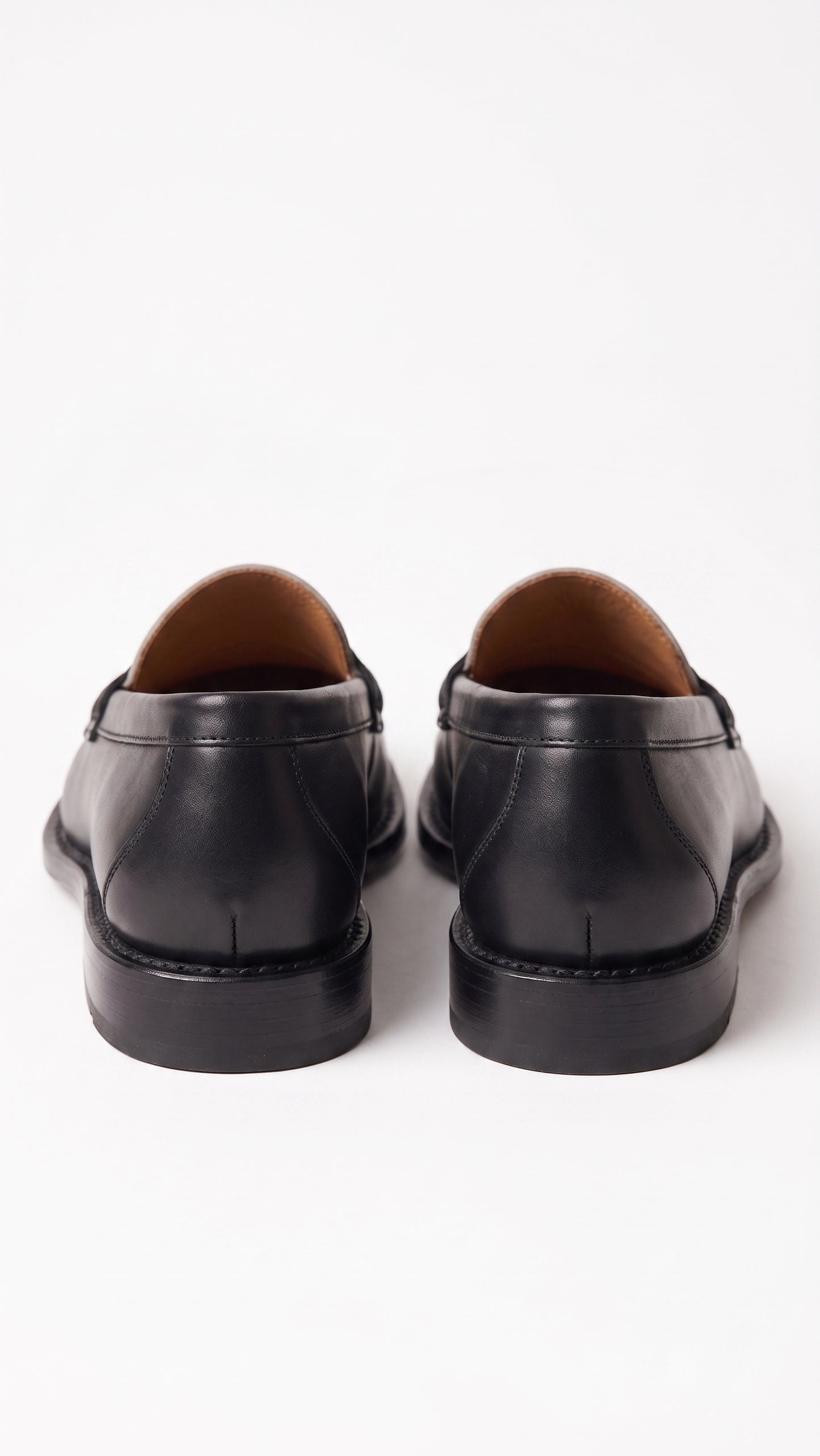 The Venice Two-Tone Penny Loafers in Noir Black & Ivory