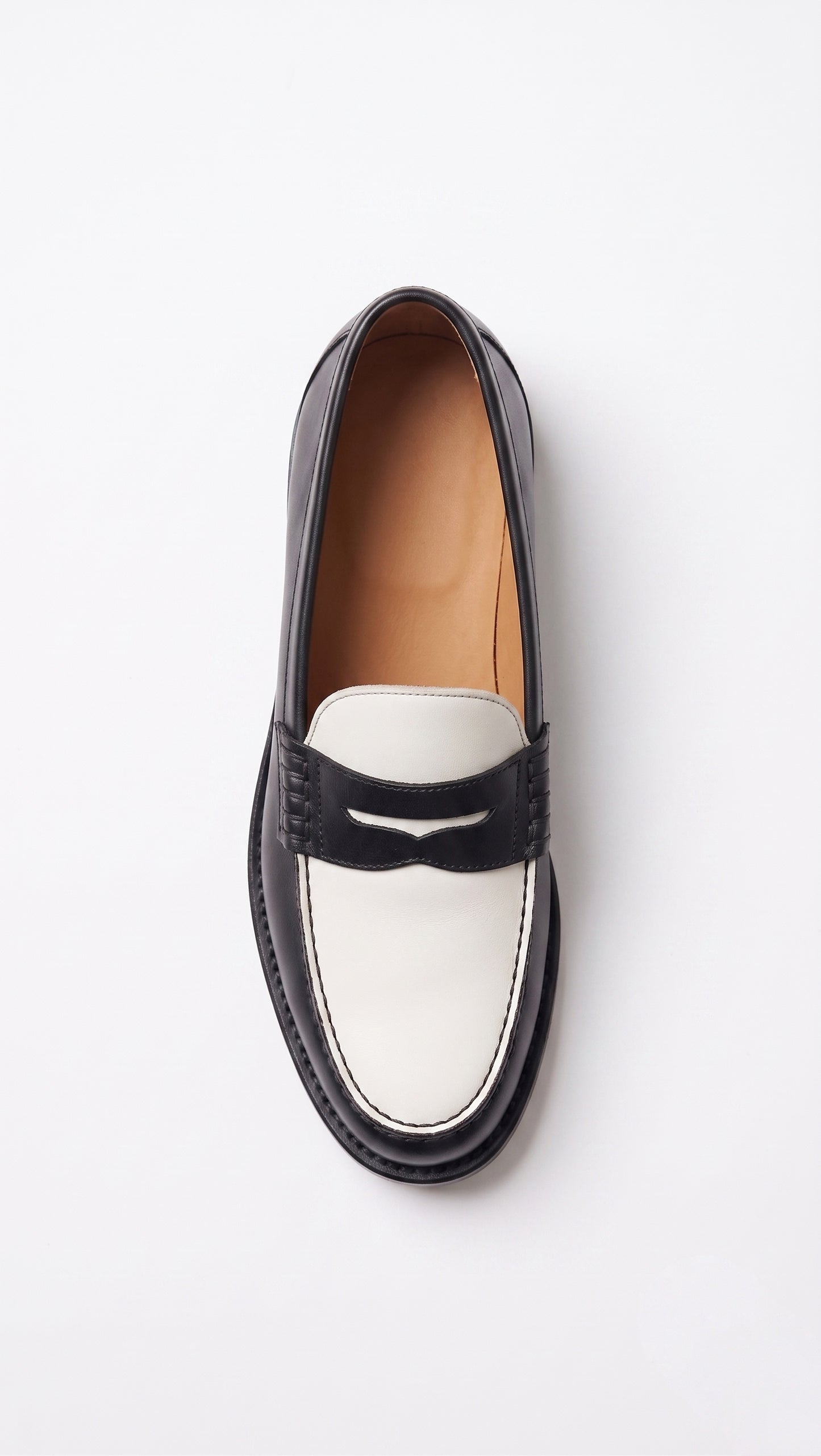 The Venice Two-Tone Penny Loafers in Noir Black & Ivory