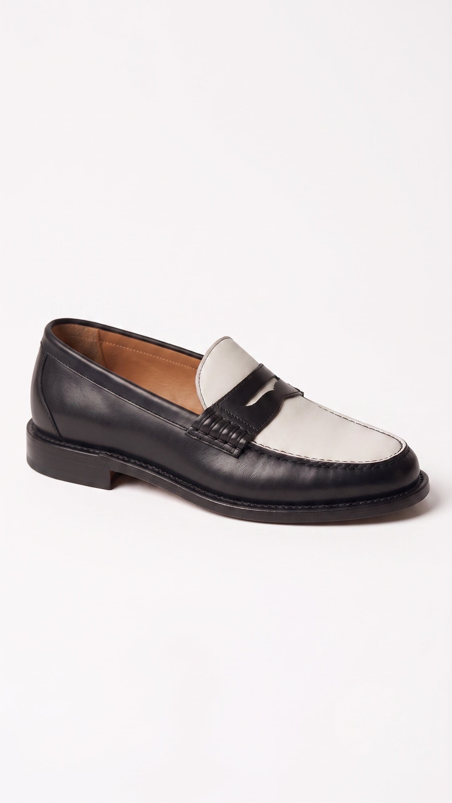 The Venice Two-Tone Penny Loafers in Noir Black & Ivory