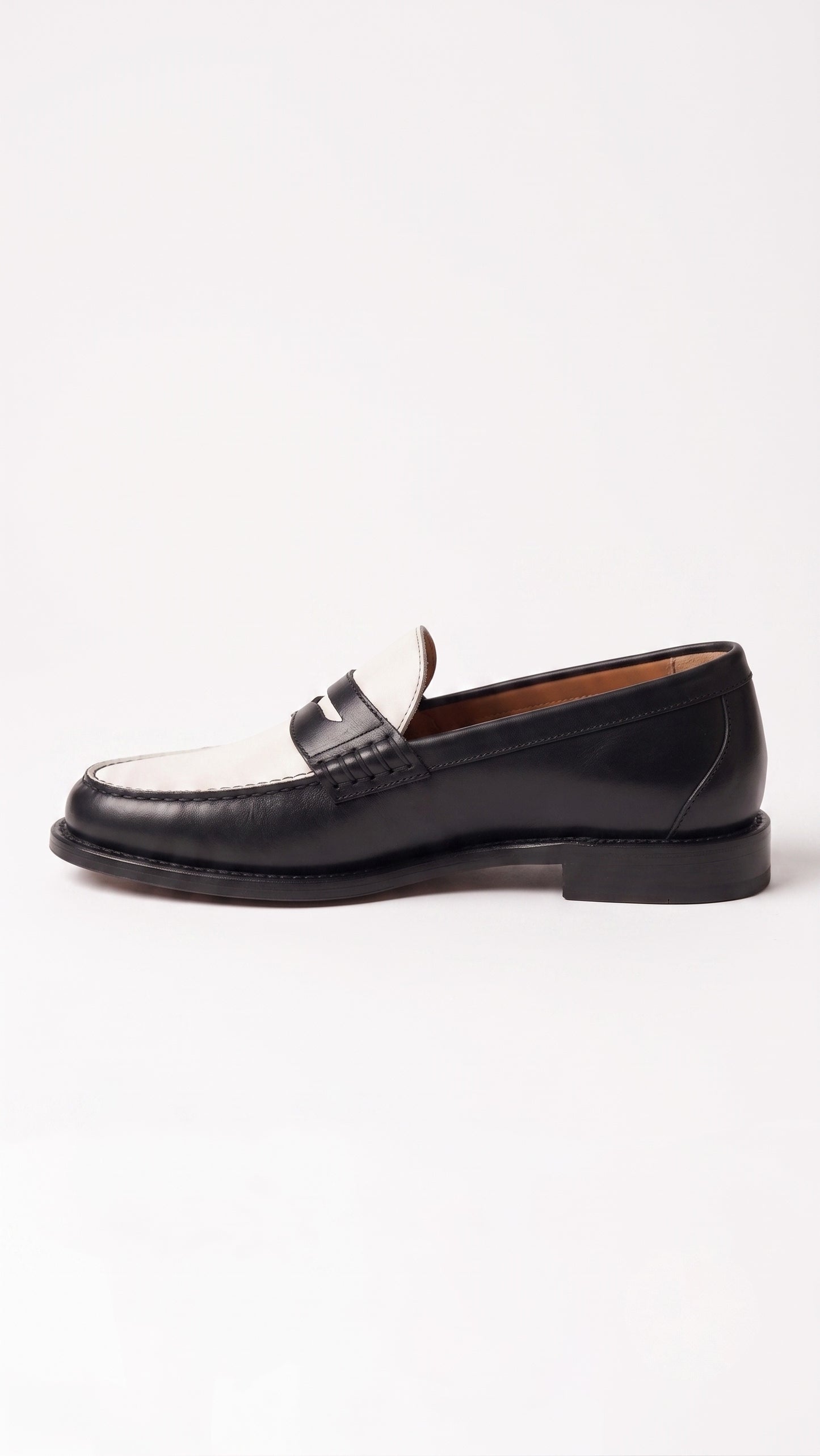 The Venice Two-Tone Penny Loafers in Noir Black & Ivory